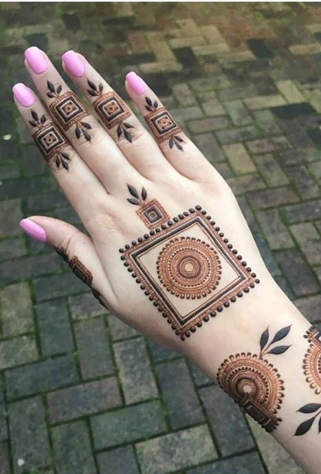 Try geometric or abstract Mehndi designs.