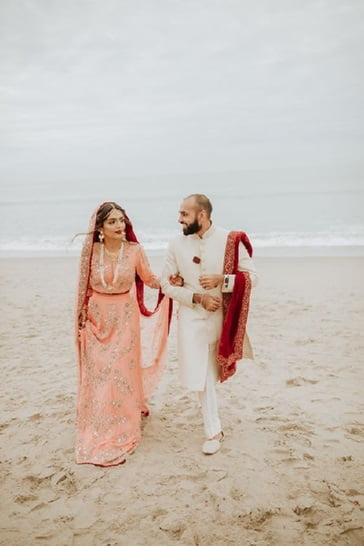 Try minimalist pearl jewelry on your beach wedding day.