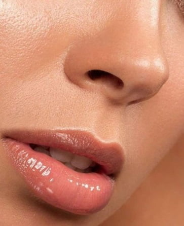 Use a final coat of lip gloss to prevent your lips from appearing dry.