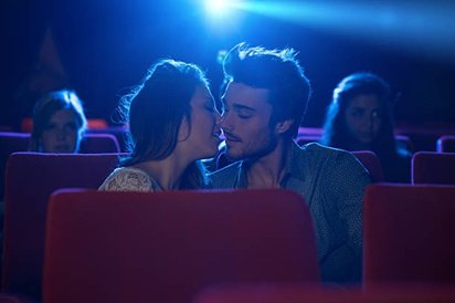 Proposing your partner in the movie hall is creative and romantic.