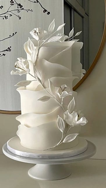 Ruffled wedding cakes have three-dimensional patterns or ridges that you can see from across the room.