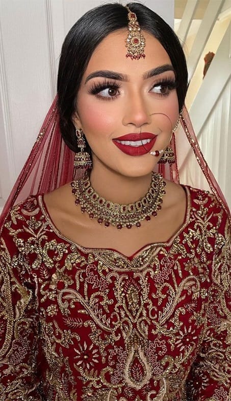 Bold-colored lips are becoming popular amongst brides this season.